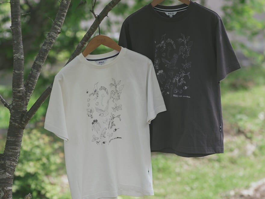 AIGLE（エーグル）が森林保全活動へのチャリティTシャツをローンチ。人気アーティストのドローイングにやさしく癒される！