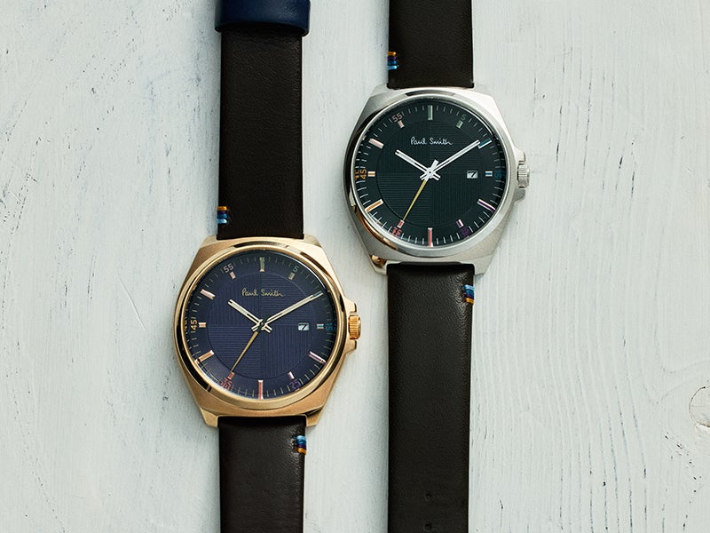 ポール・スミスのメンズ腕時計「クローズド アイズ」の商品画像。右がダークグリーン、左がネイビー。