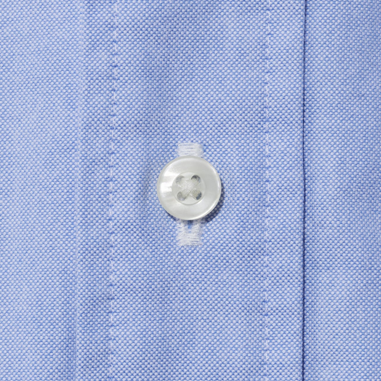ユニクロのオックスフォードシャツ（長袖）　ブルー　　ボタン
