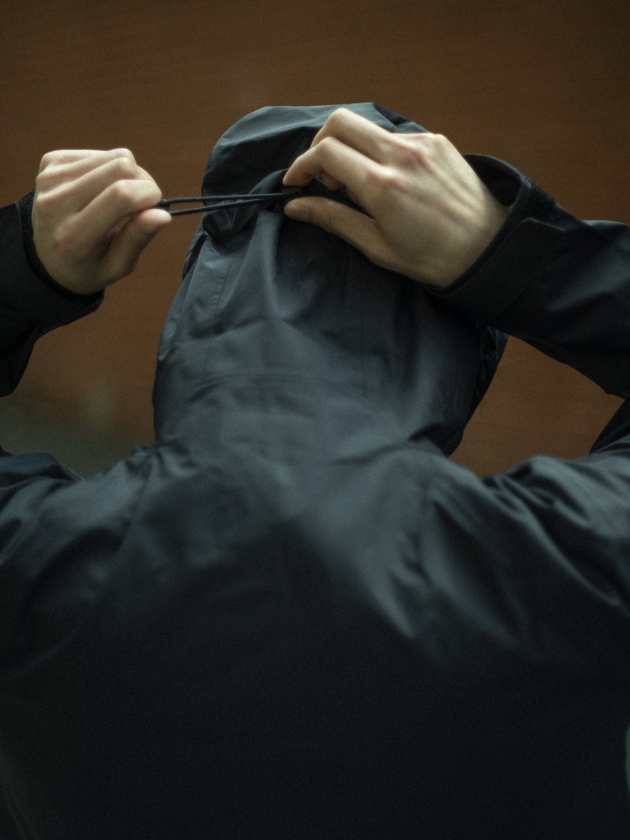 Patagoniaの黒い定番名品ジャケットのドローコード