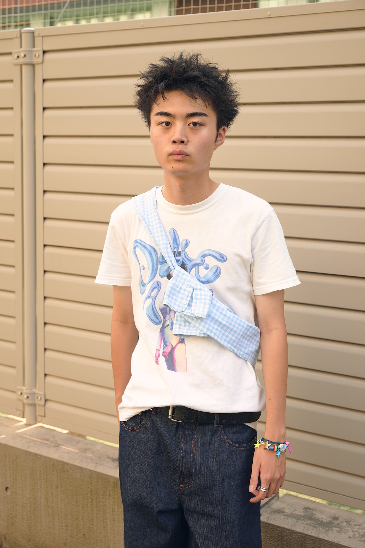 ニューバランスを履いた奈良匠真さんの上半身