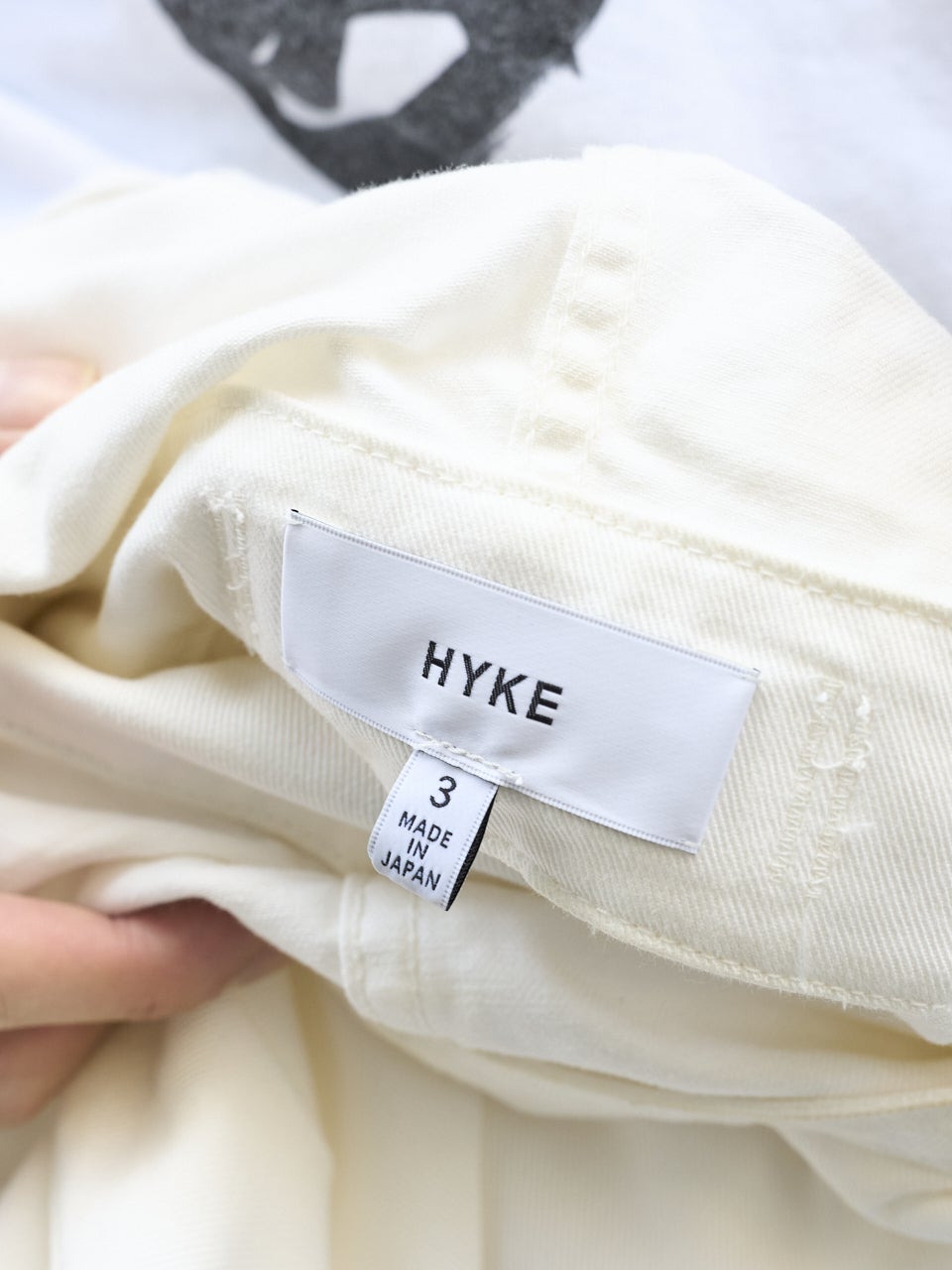 HYKEのパーカーのタグ