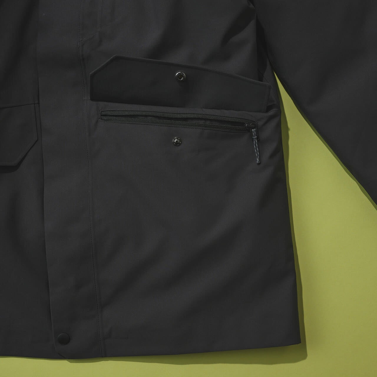 パタゴニアのメンズ・トレス・スリーインワン・パーカ ダウンジャケットのフロントのフラップポケット