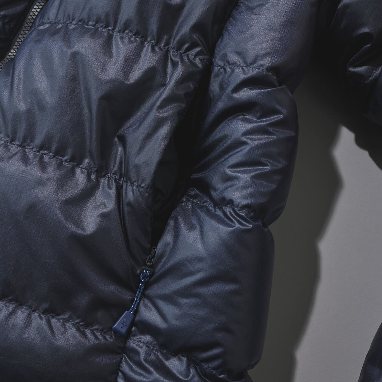 アルパインダウン ジモンベルのアルパインダウン ジャケットのハンドウォーマーポケット