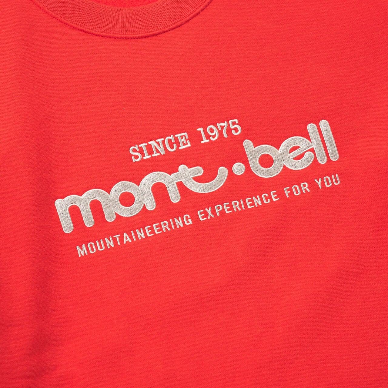 モンベルの50th コットン スウェットシャツ ロゴのフロントロゴ