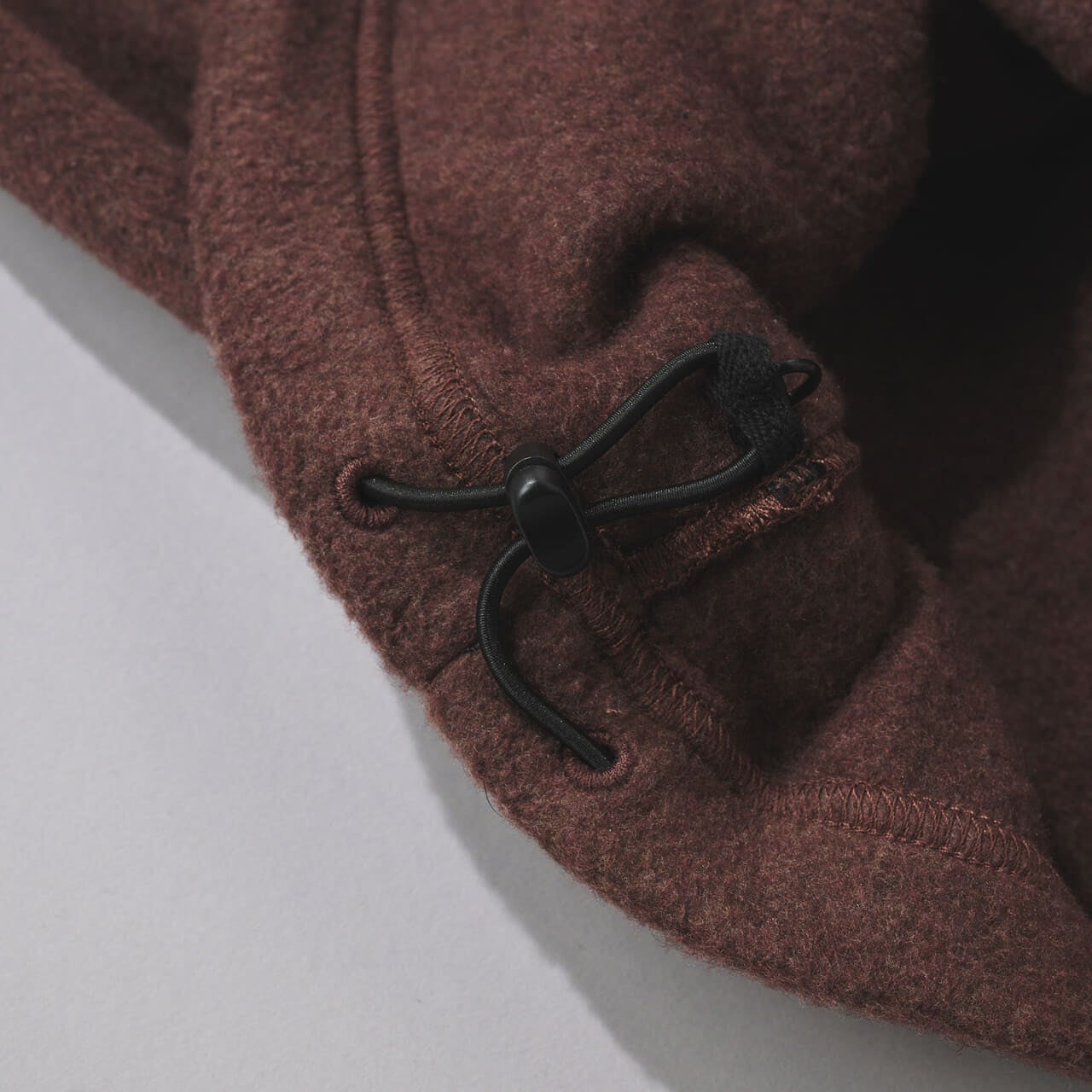 チャンピオンとビームスのコラボフリースジャケットの裾コード