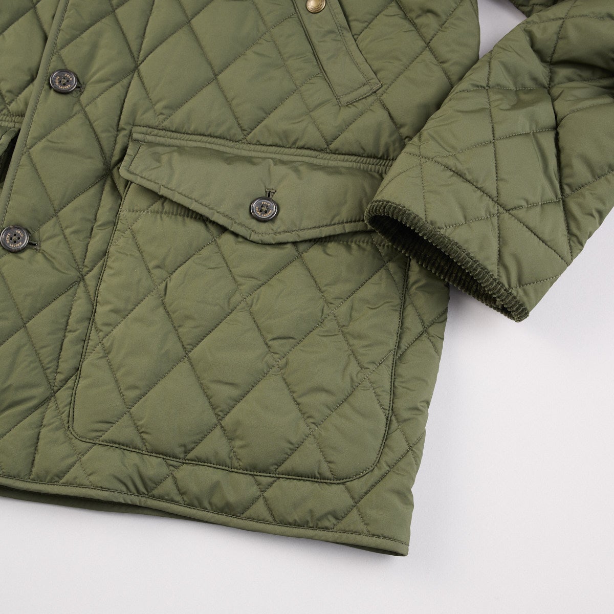 ポロ ラルフ ローレンのキルテッド カー コートのフロントポケット