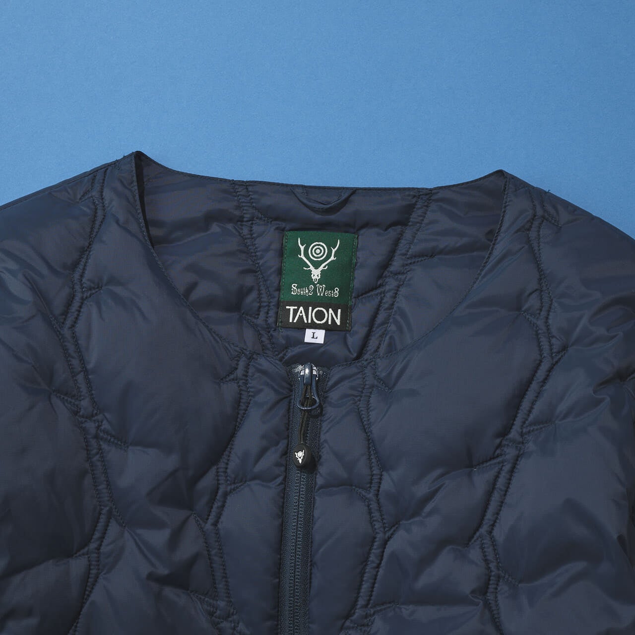 タイオン 新作ダウン South2 West8 x TAION Inner Down Jacket ロゴ