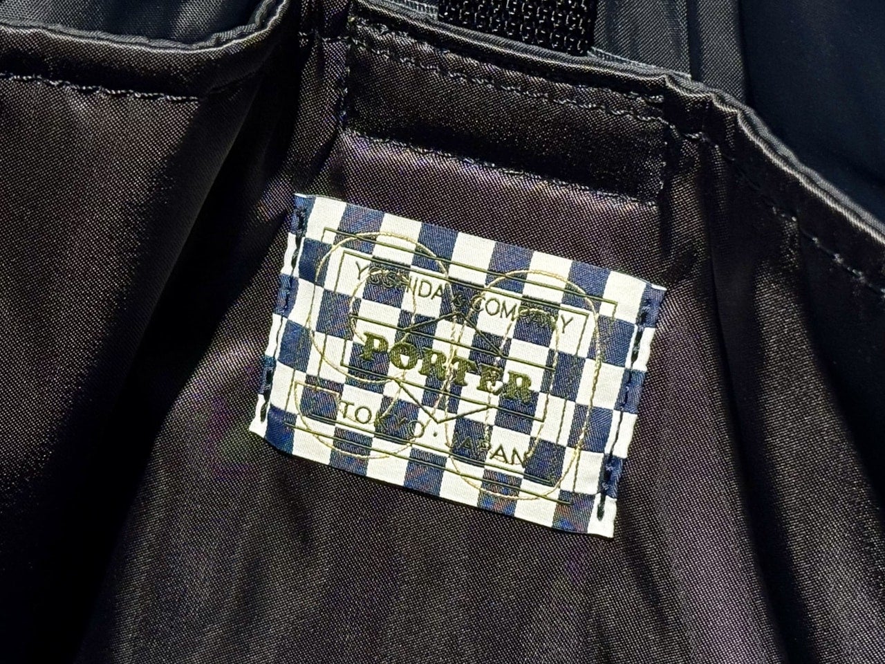 吉田カバン90周年ロゴ