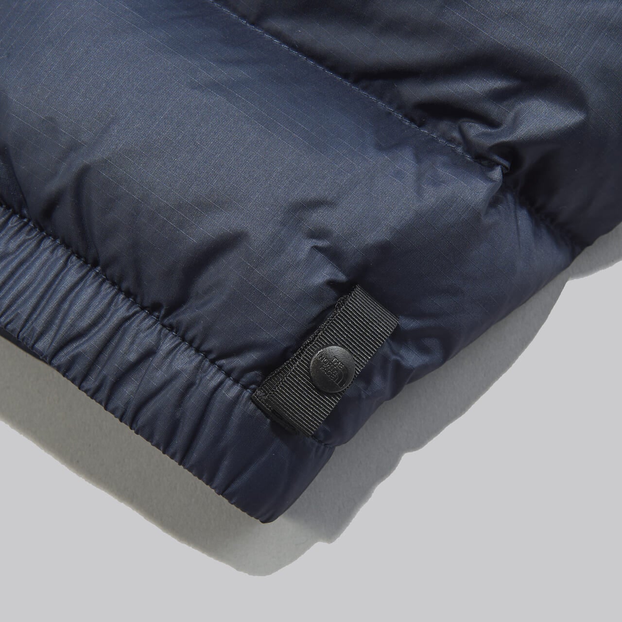 ザ・ノース・フェイスのヌプシジャケット ダウンジャケットのジップインジップのディテール