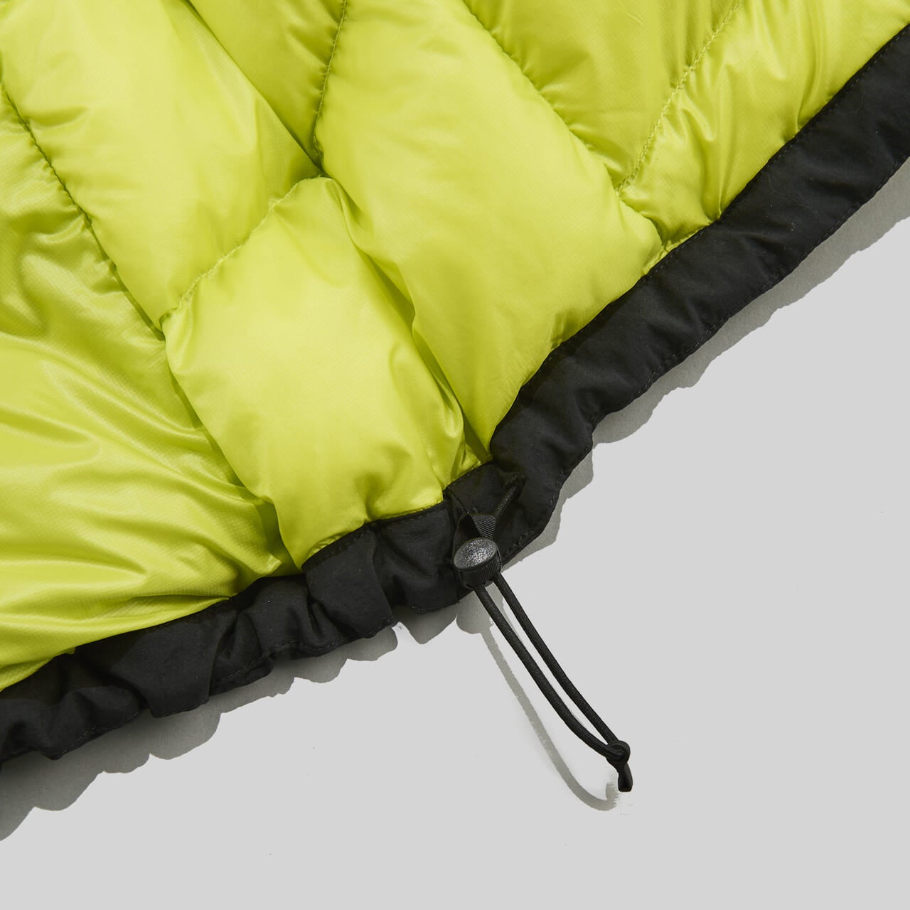 ザ・ノース・フェイスのジップインジップアコンカグアジャケット ダウンジャケットのドローコード