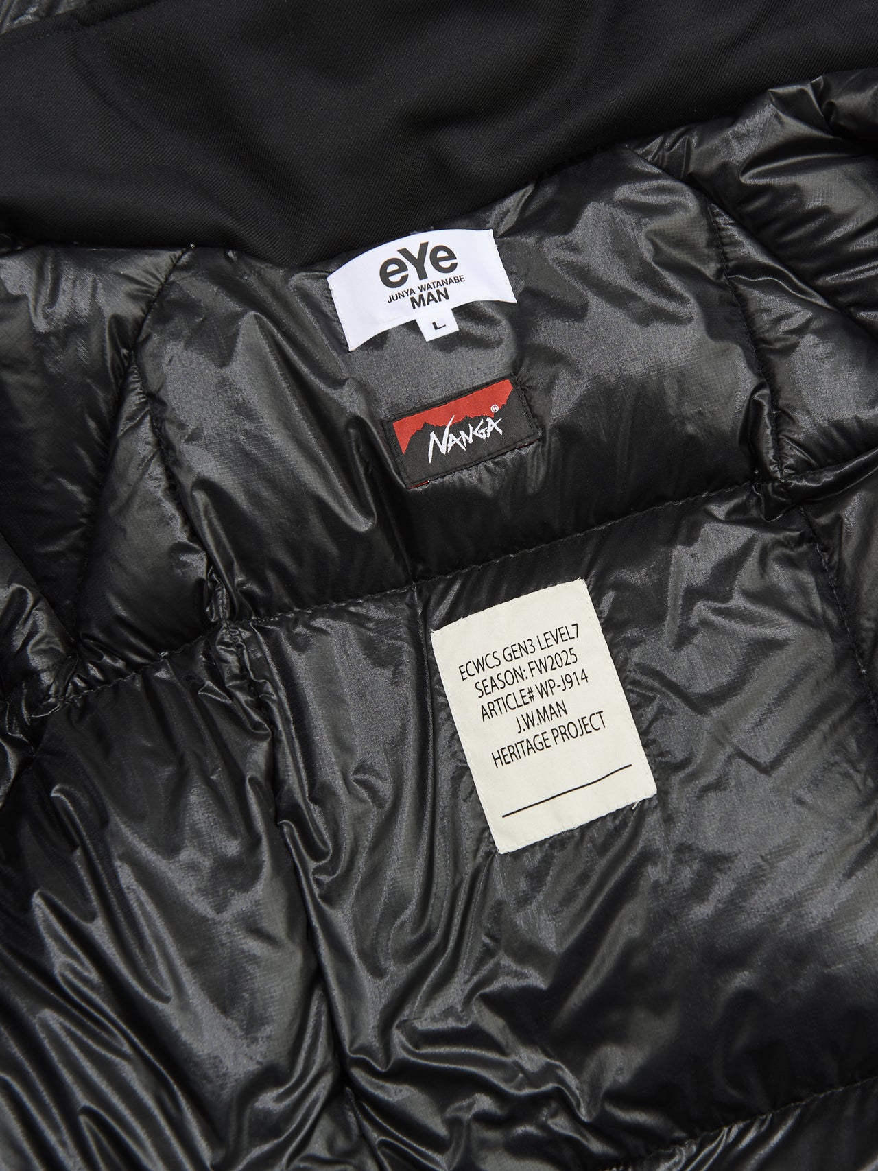 eYe ジュンヤ ワタナベ マンとナンガの黒いコラボダウンジャケットのタグ