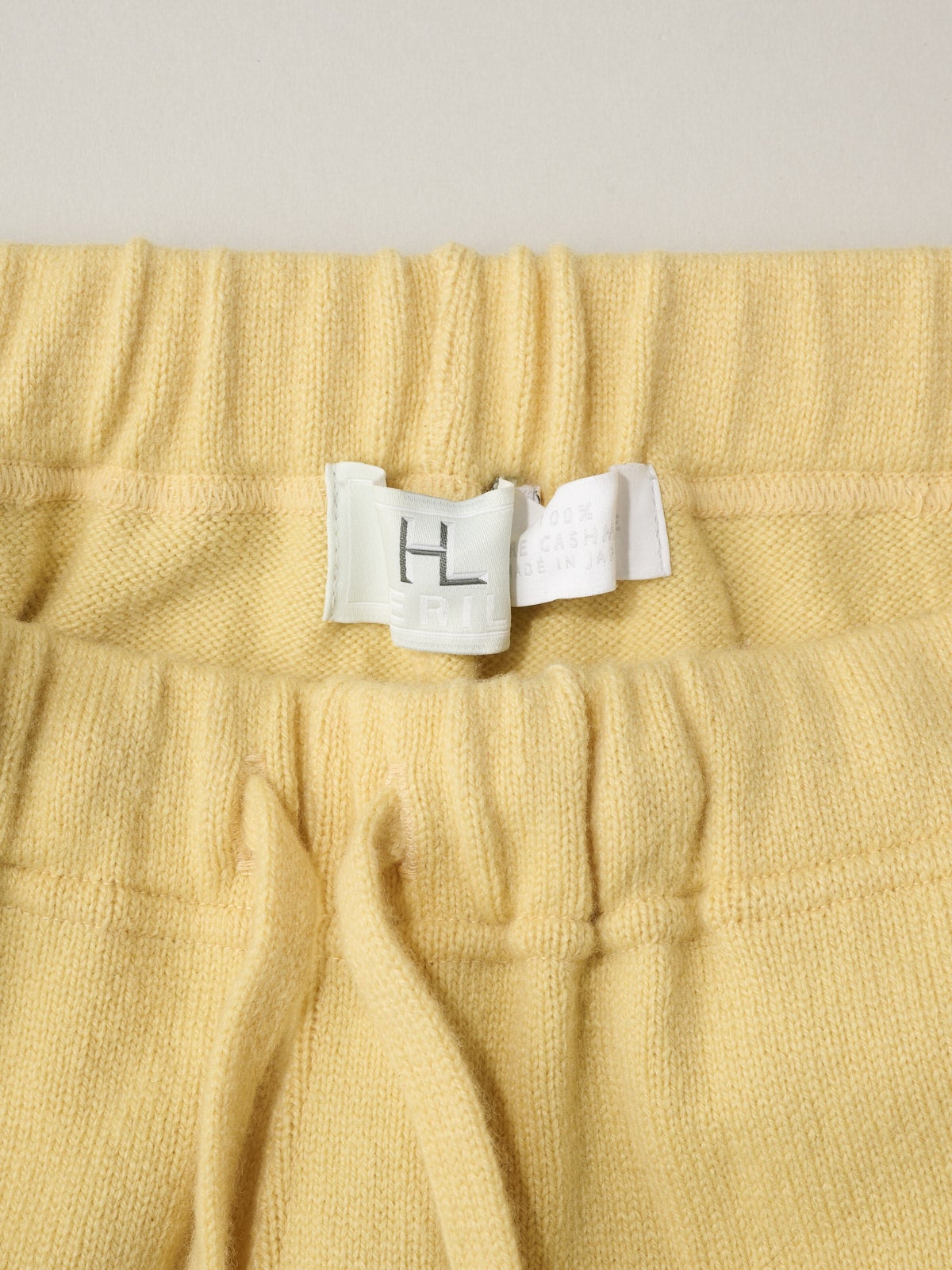 HERILL、パンツ、タグディテール