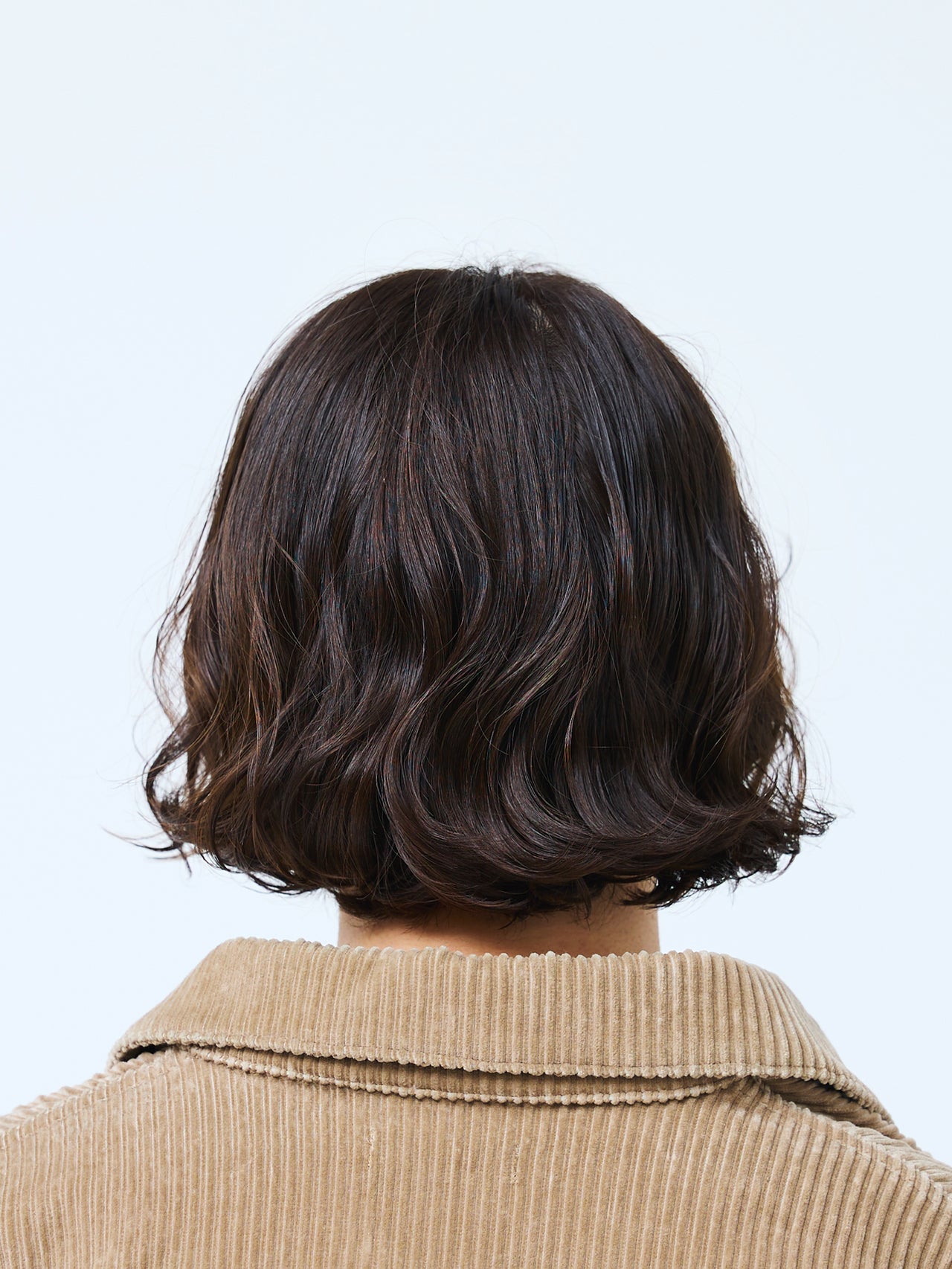やり過ぎない個性が光る、ニュアンスパーマで作る重めボブ