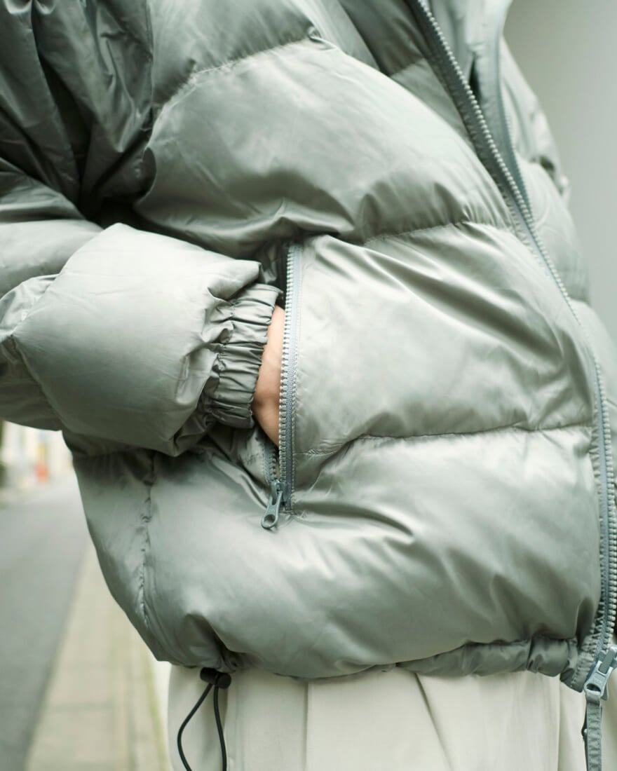 ユニオンウェアのダウンジャケット（セージ色）のポケット部分