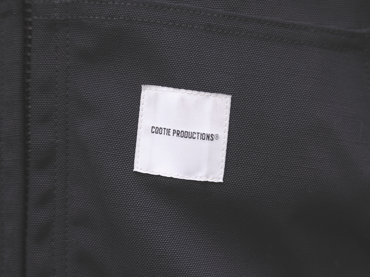 RAF kitasando 遠山 洵さんの冬スタイル ブランドのタグ