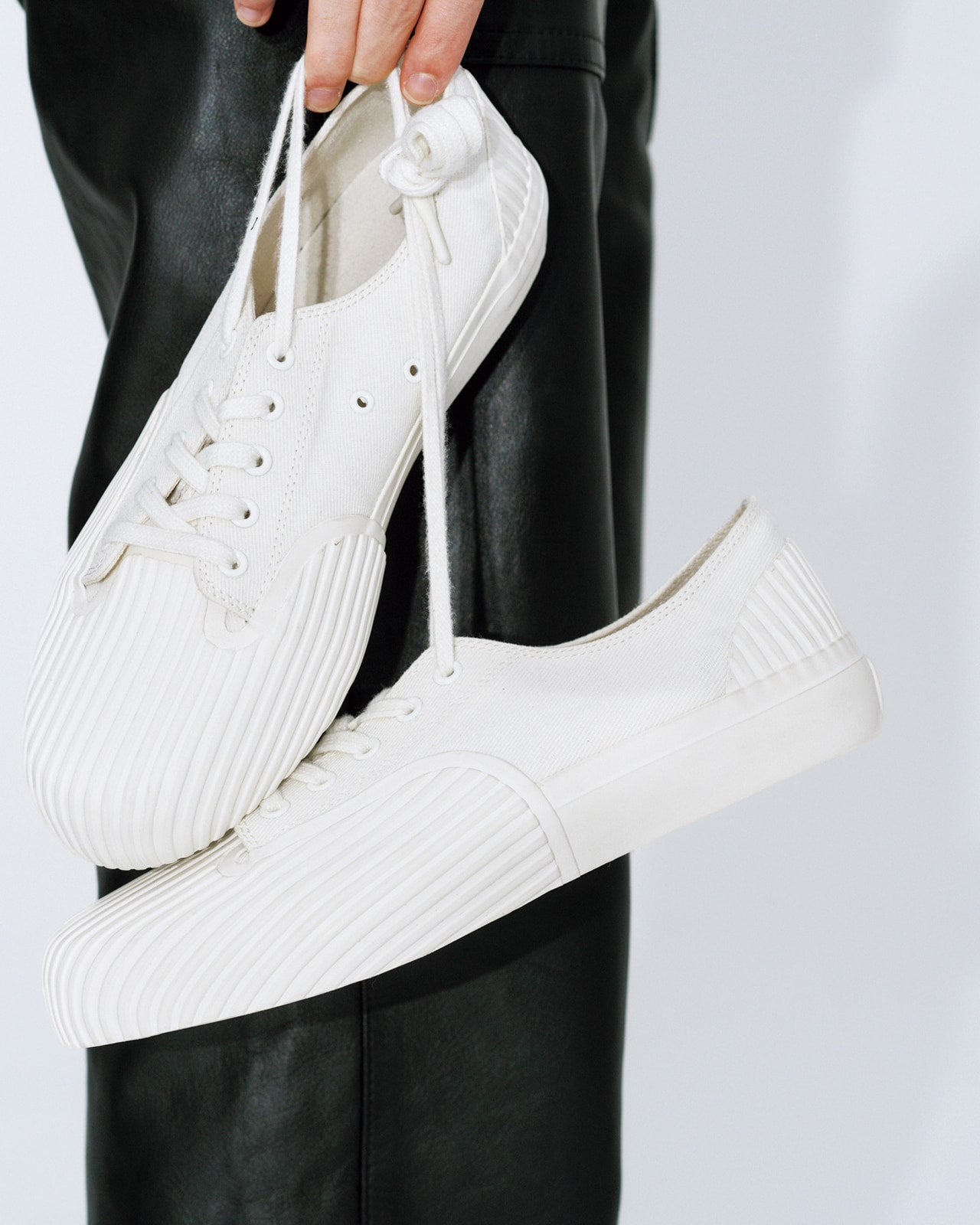 豊田裕大が着用するUnformedのスニーカー