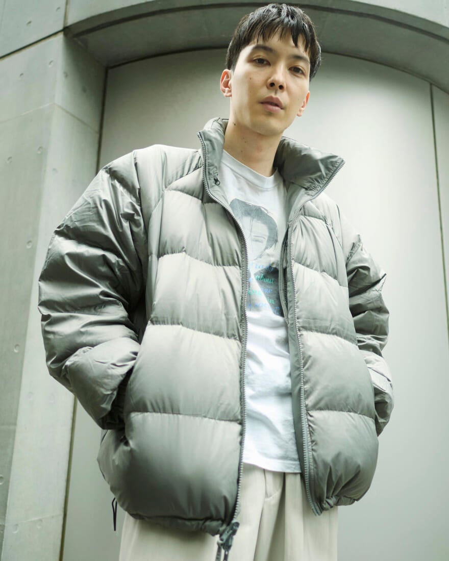 ユニオンウェアのダウンジャケットを着用するメンズノンノモデル守屋光治の上半身