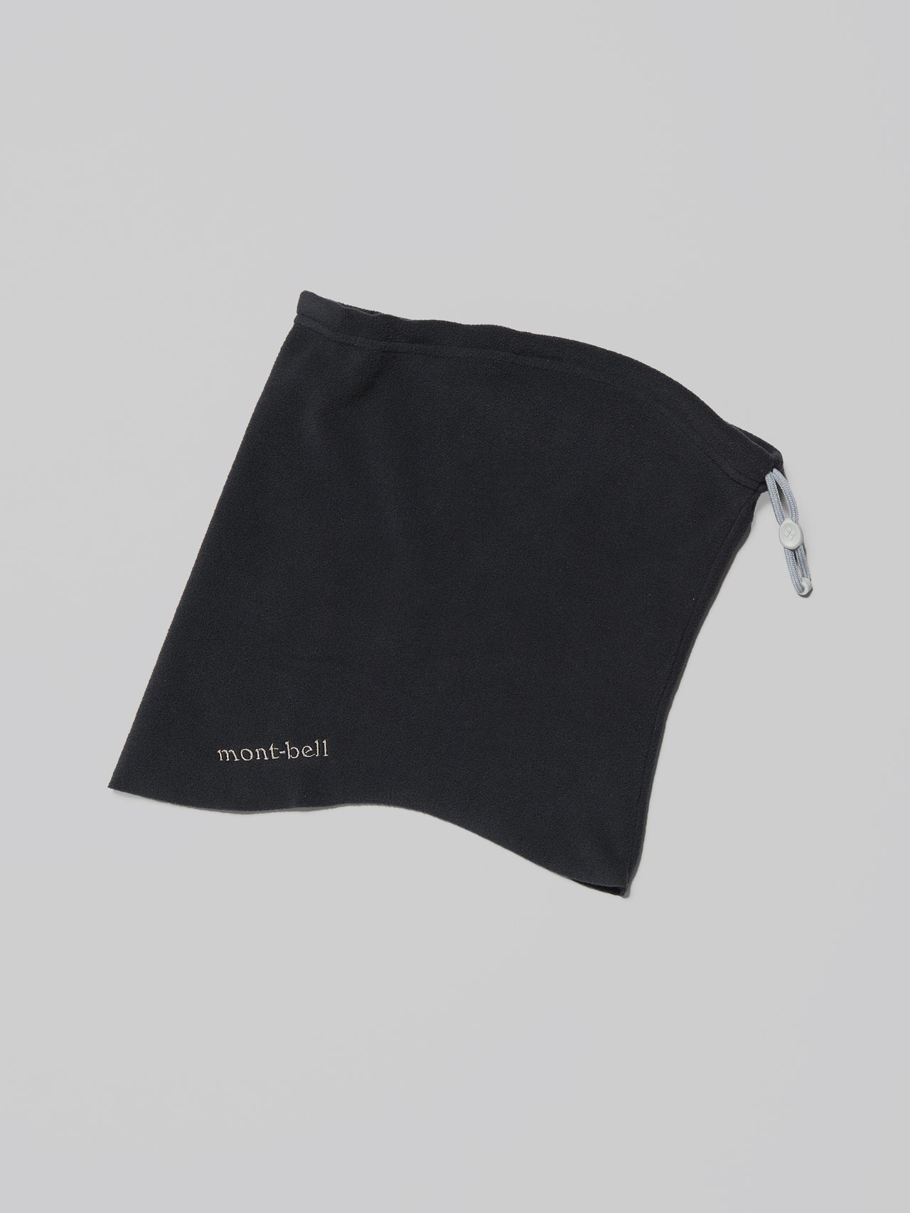 モンベルの黒いシャミース アジャスタブルネックゲーター