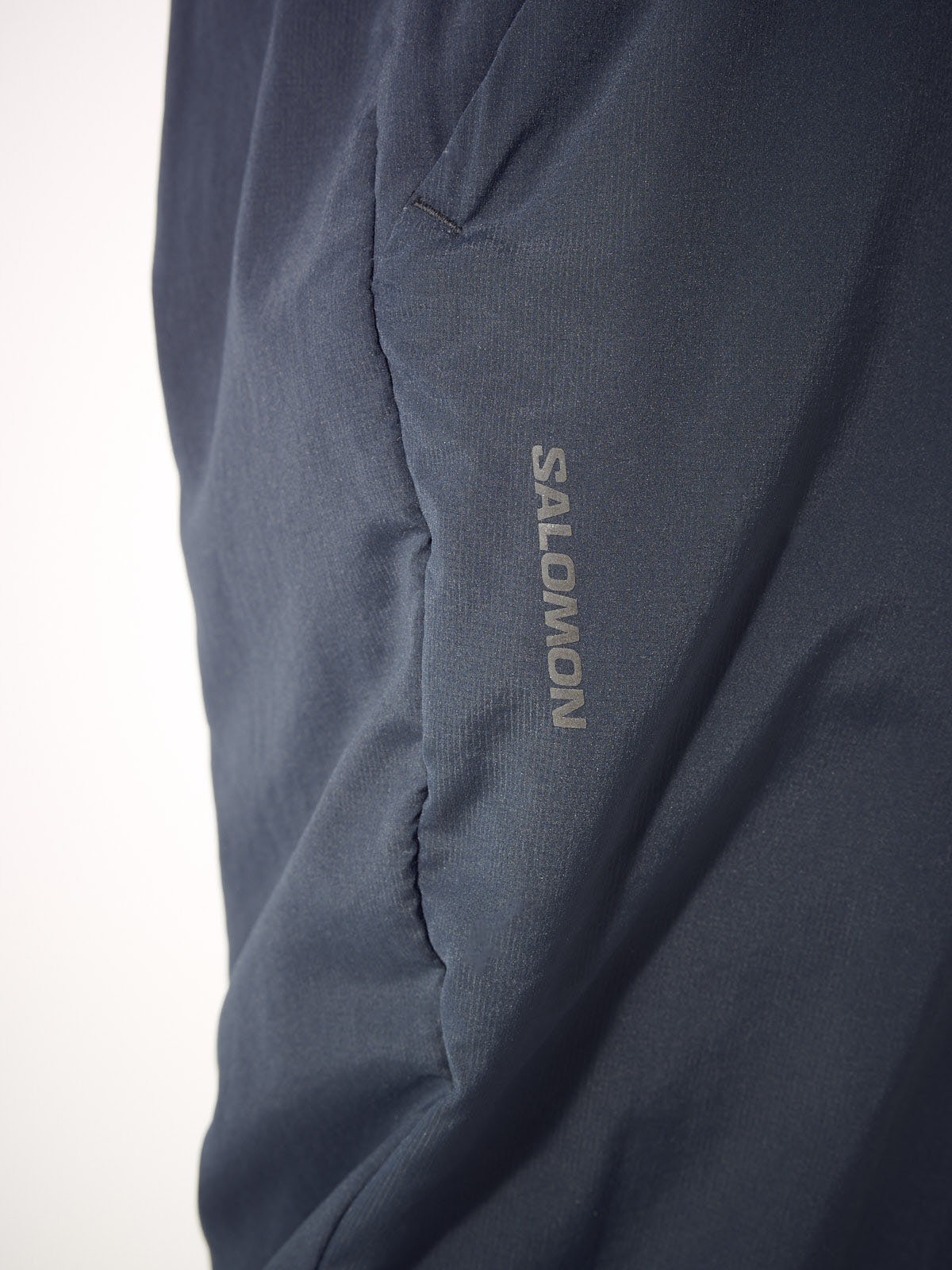 Salomon、MOUNTAIN FLEX PANTS、ロゴ