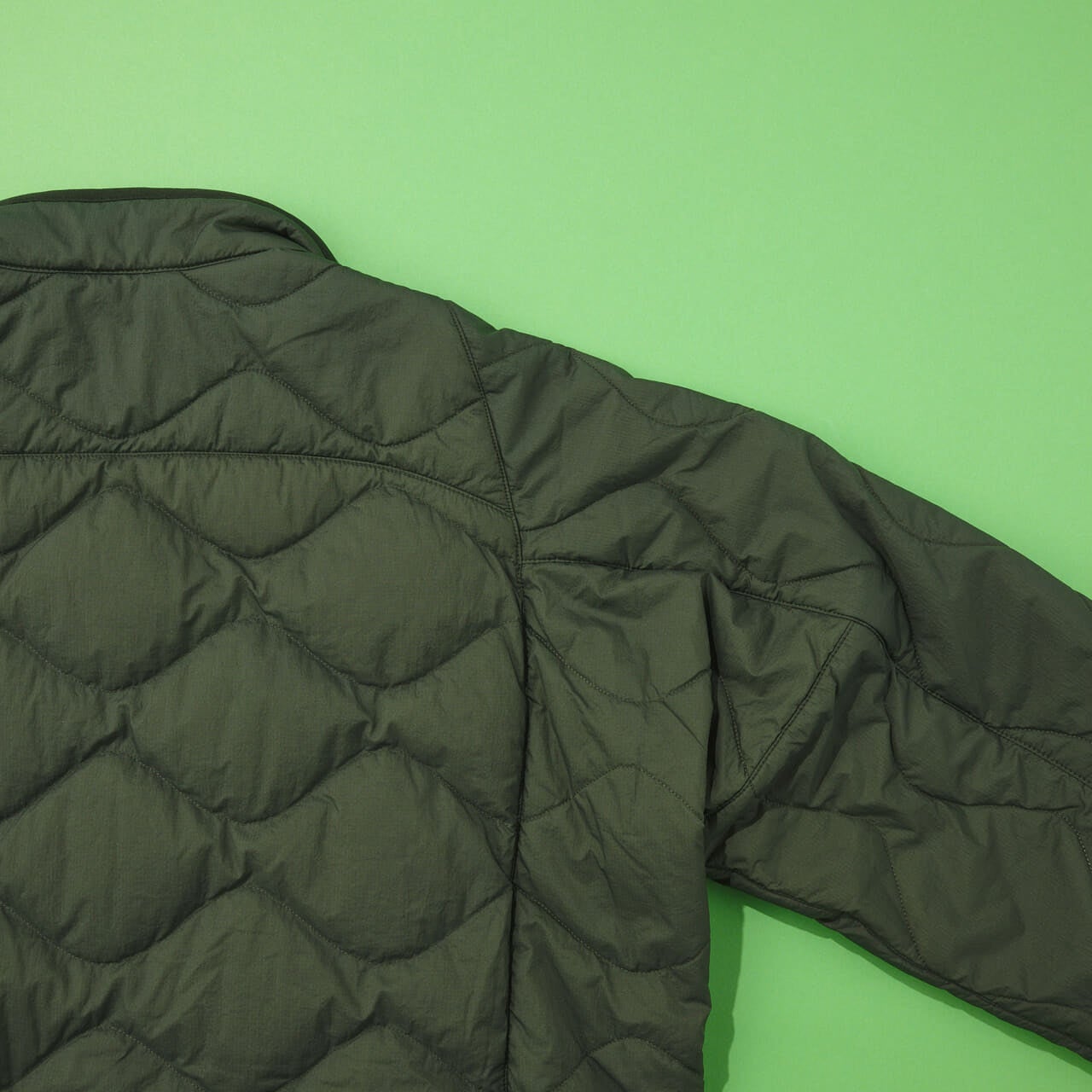 エディターが買ってよかったユニクロ×ホワイトマウンテニアリングの愛用コラボダウンのボディ裏