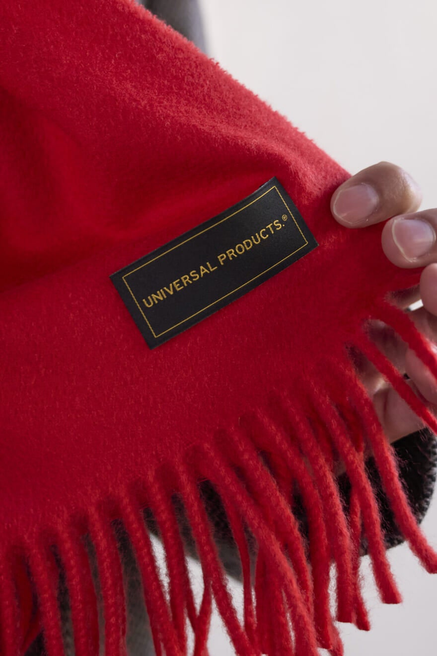 ユニバーサルプロダクツのマフラーのロゴ