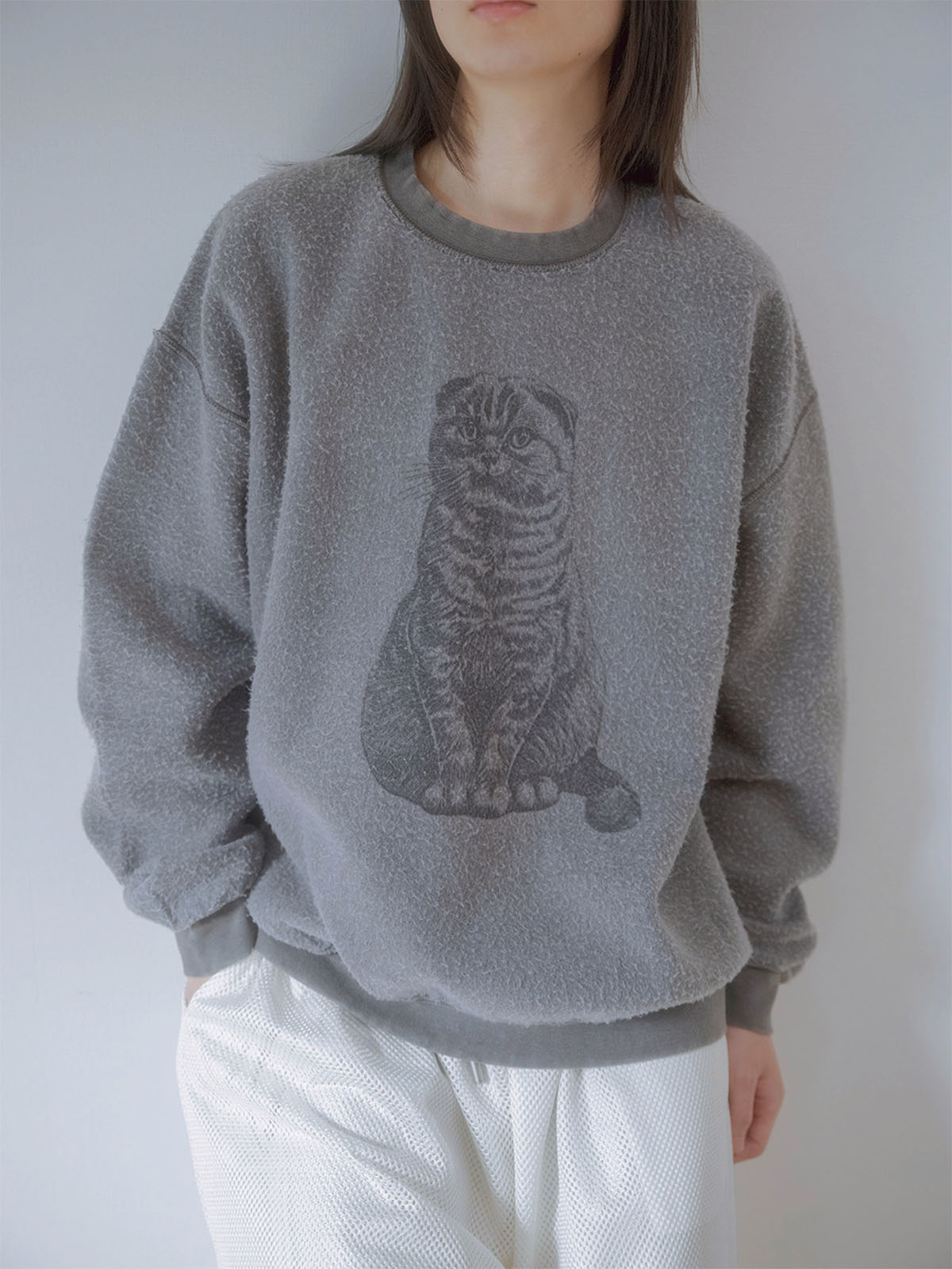 ヴィンテージスタイルのスウェットの着こなし