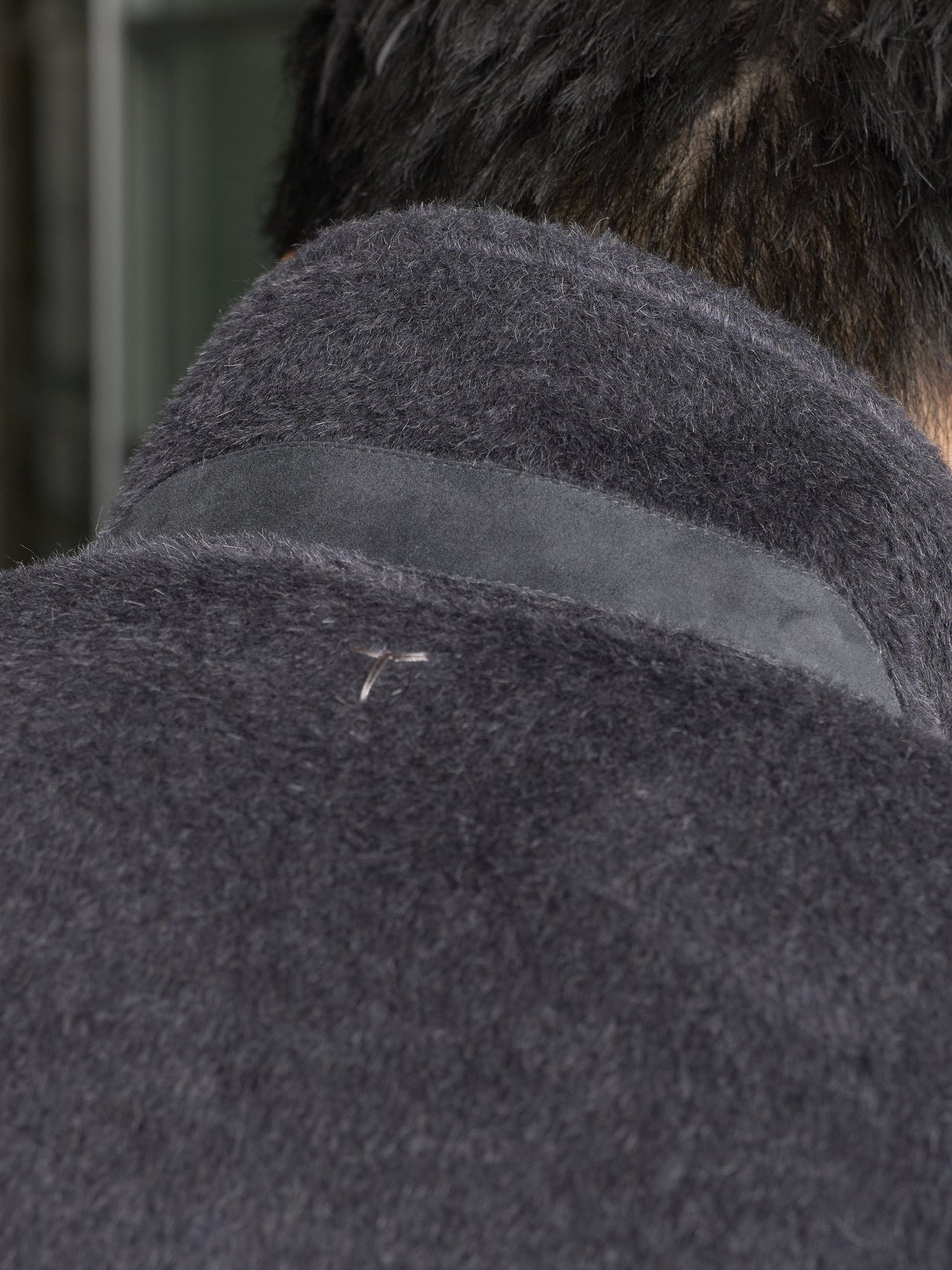 トッズのコートのバックの寄り