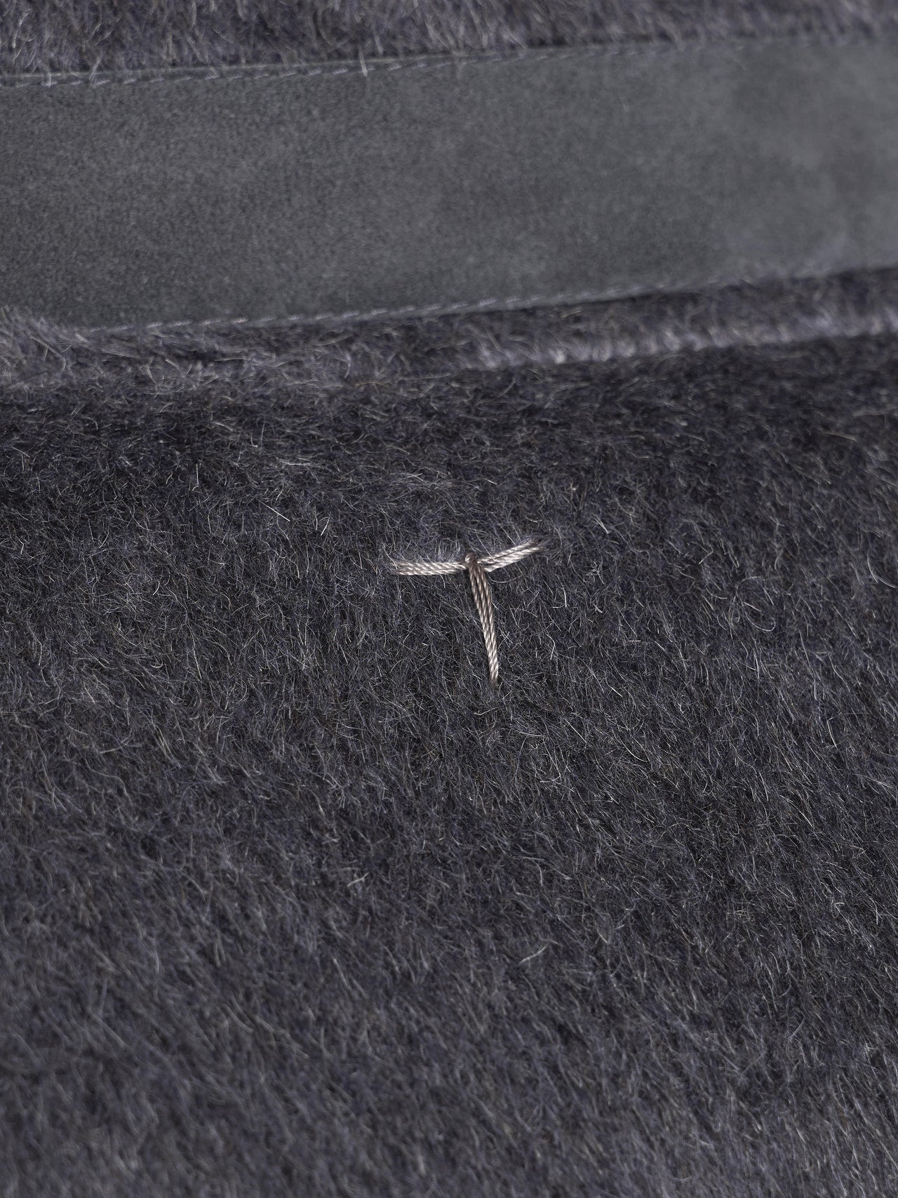 トッズのコートのロゴ