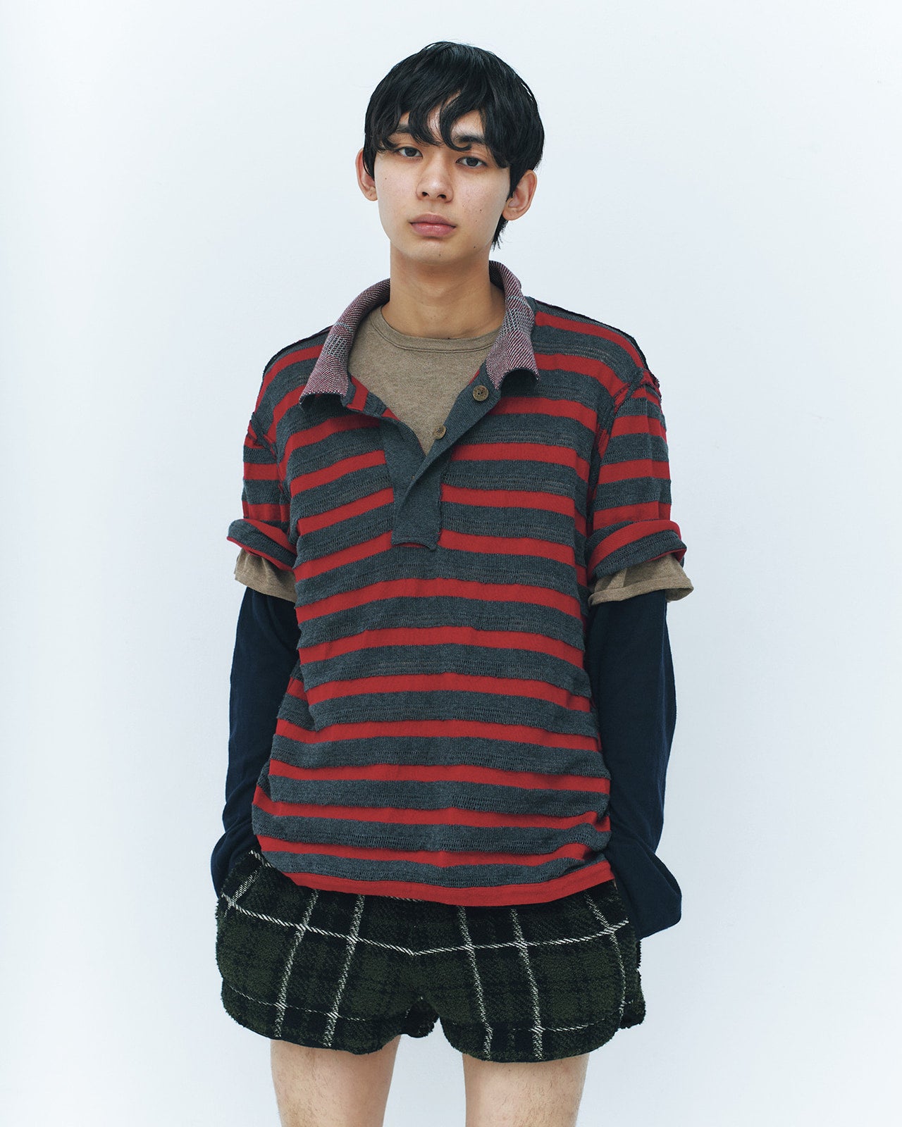 松井大奈が着用するイサ ボールダーのポロシャツ