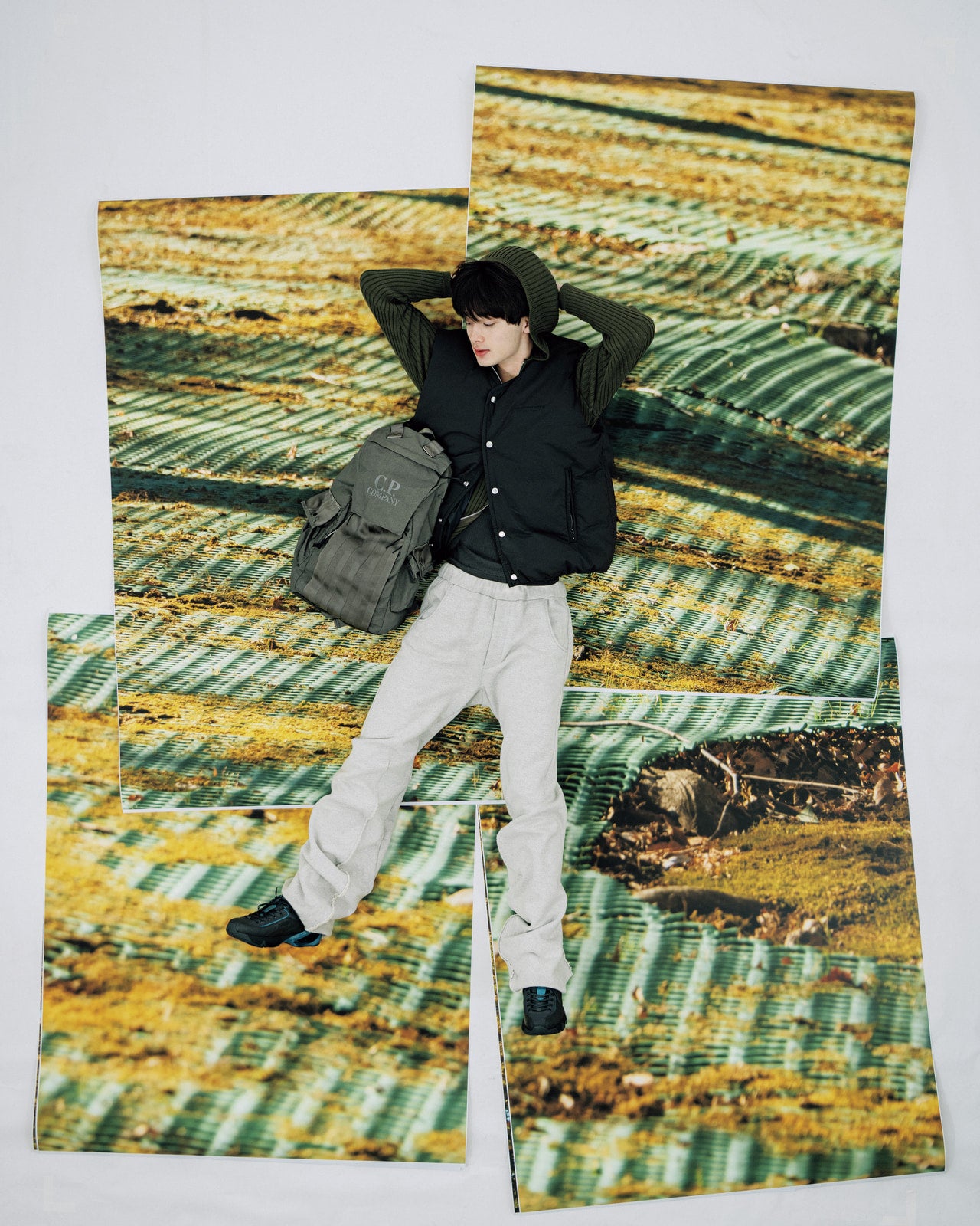 栄莉弥が着用するシーピーカンパニーのバックパック