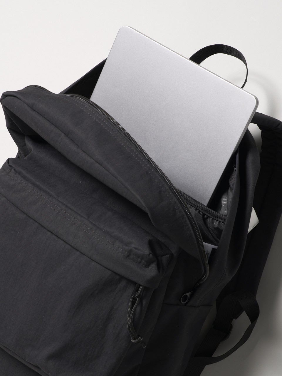 ジャンスポーツ、黒バックパック、内側