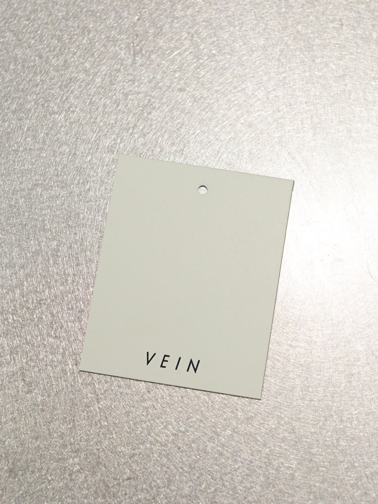 ファッションブランド「VEIN」のタグ