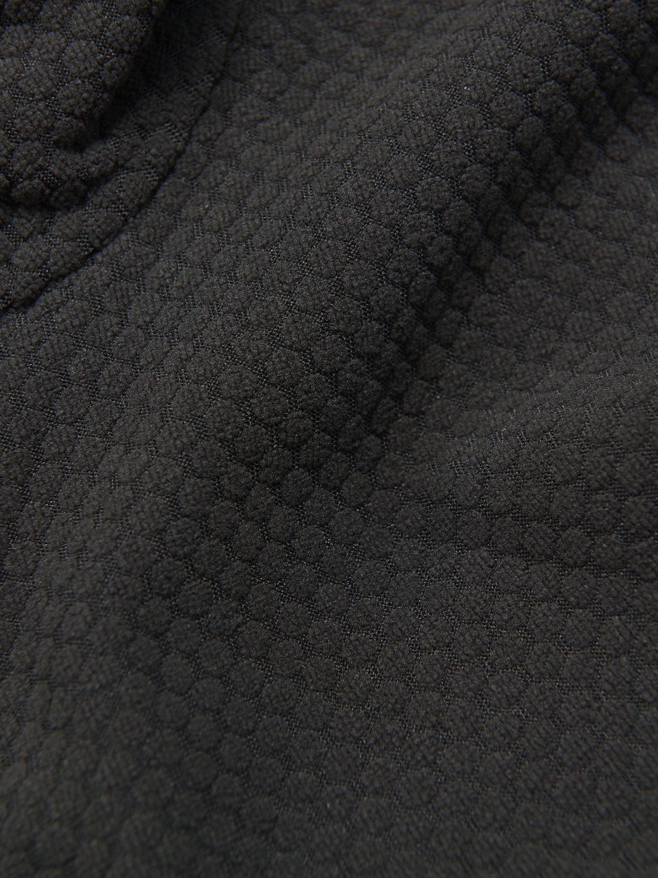 パタゴニアのメンズ・テクスチャード・フリース・ベストの保温効果をもたらす粒状パターン