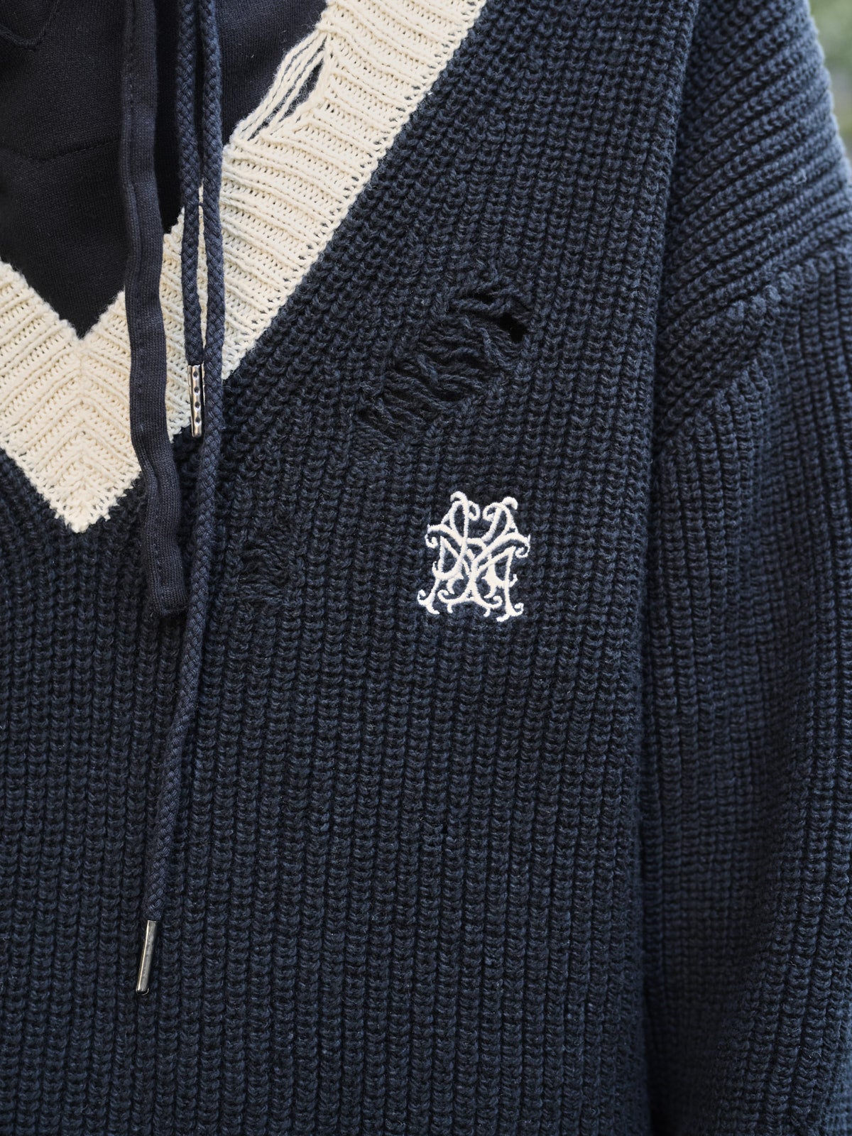 カミヤのニットのロゴ