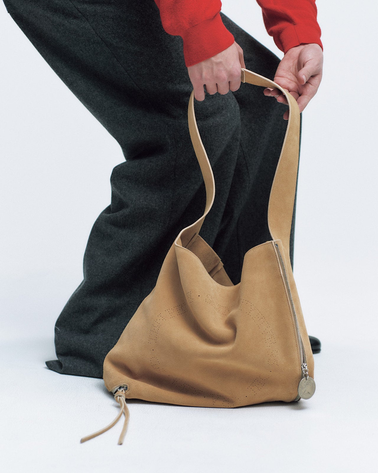 嵐 翔真が着用するシックスナインティーファイブのバッグ