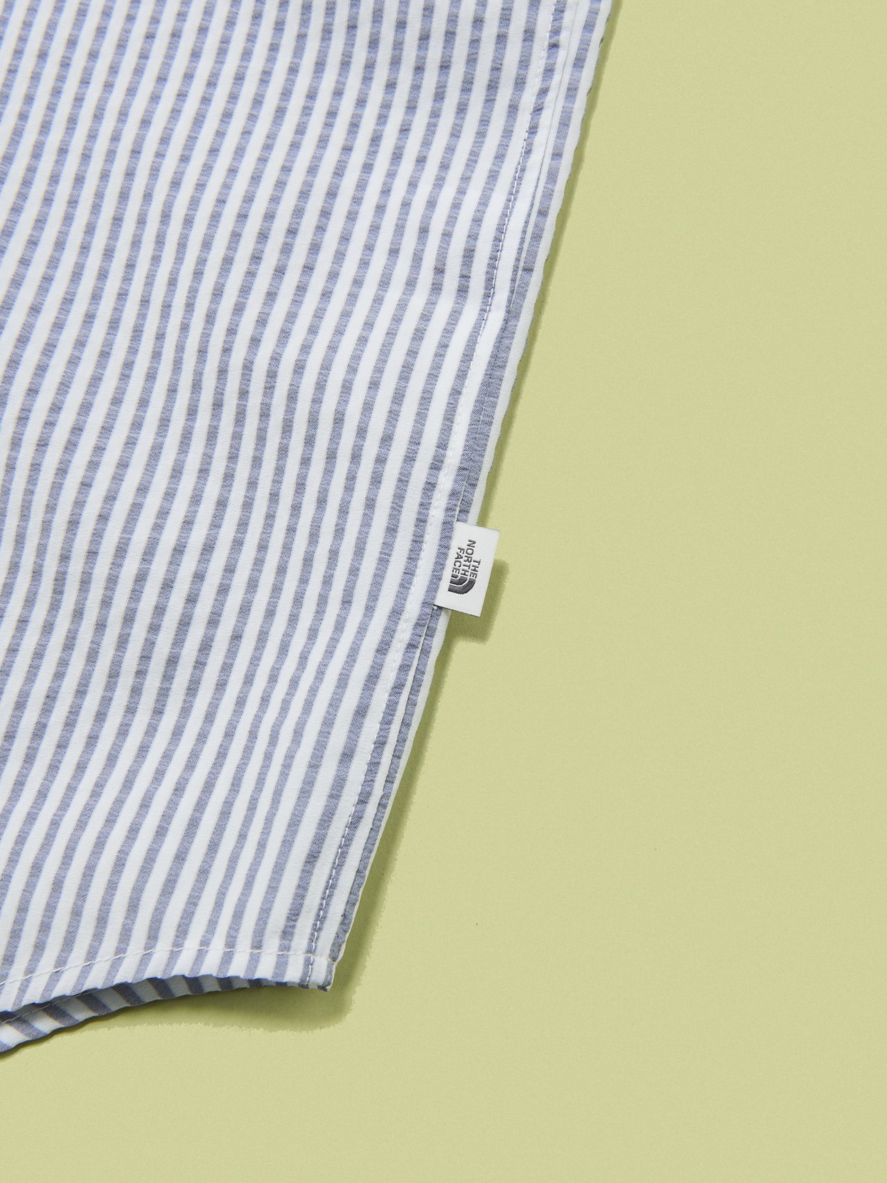 ザ・ノース・フェイスのGARロングスリーブシャツのサイドのピスネーム