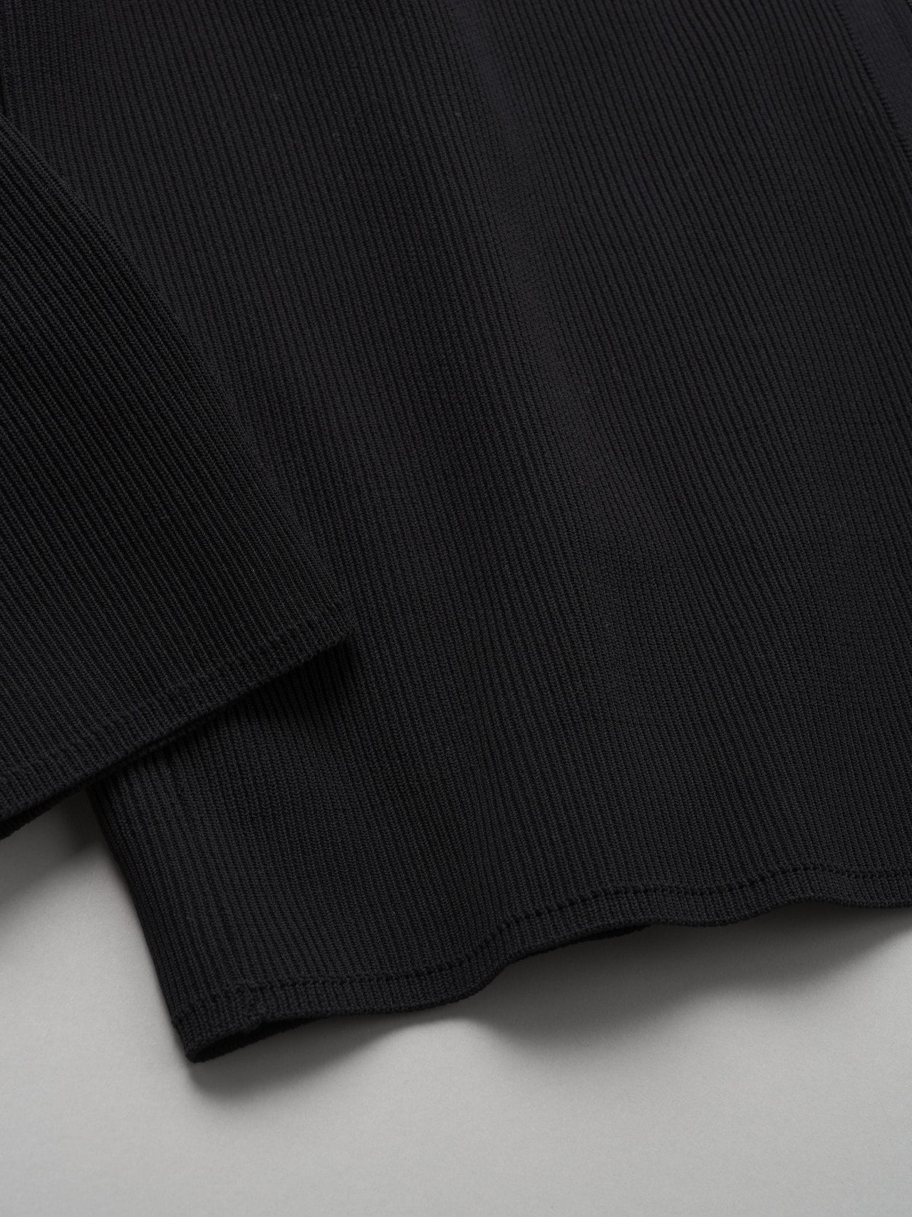 無印良品 紳士 乾きやすい洗えるリブ編みニットブルゾンの裾部分
