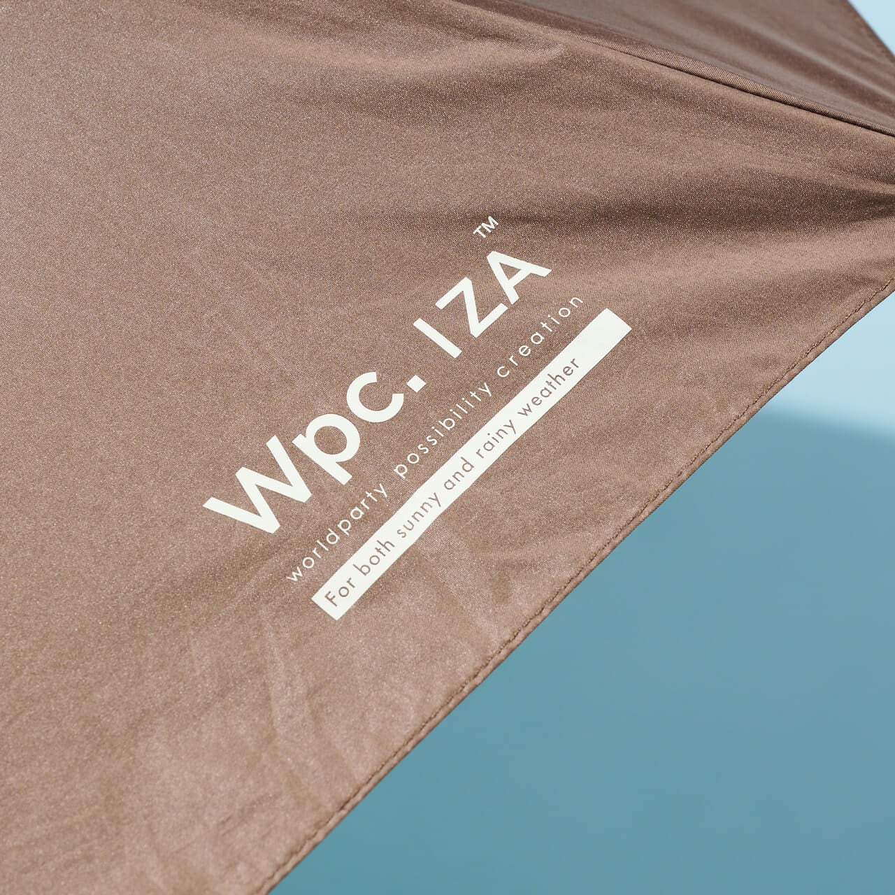 Wpc. IZA (イーザ)のエディター愛用日傘(晴雨兼用)のロゴ