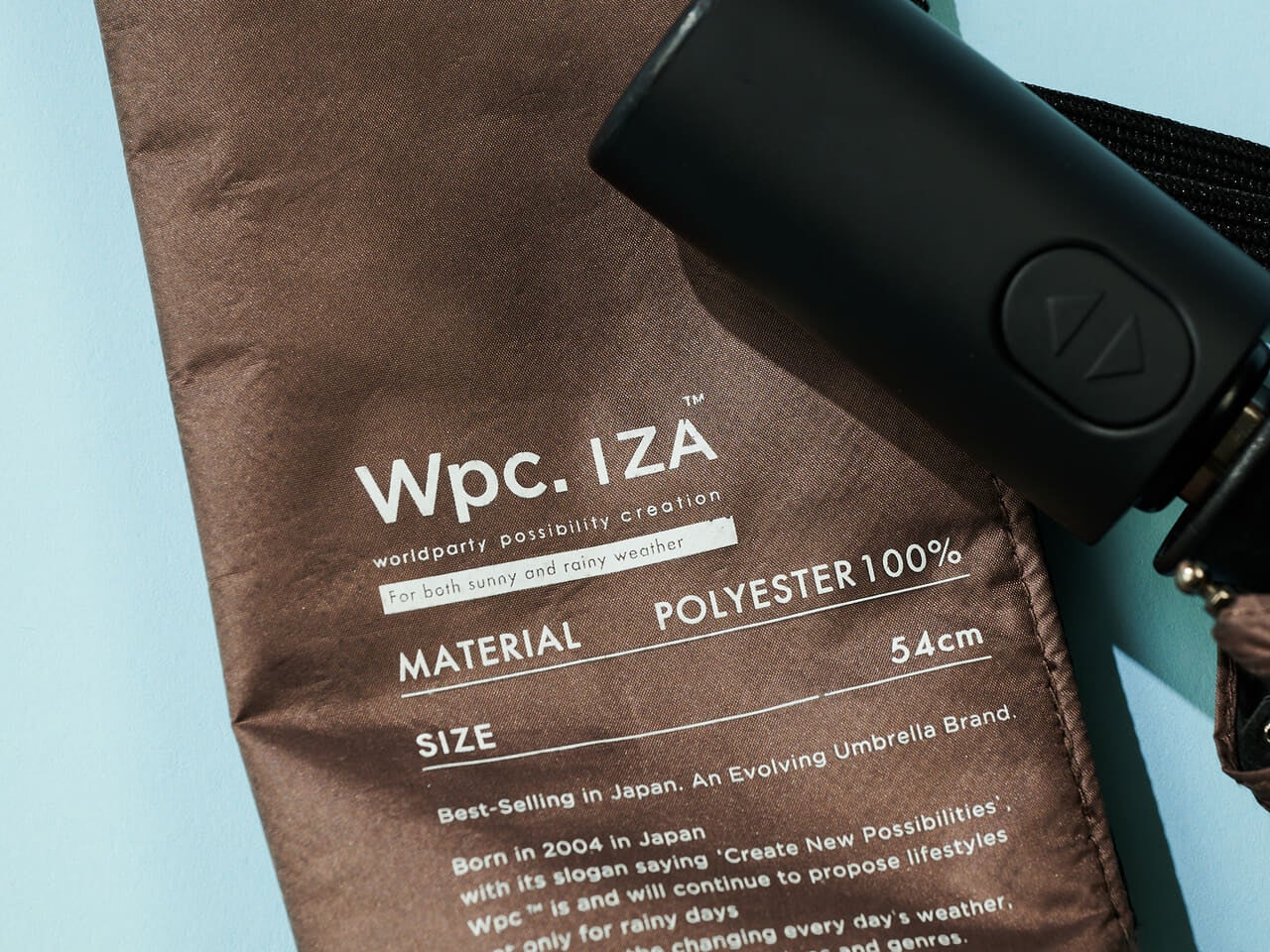 Wpc. IZA (イーザ)のエディター愛用日傘(晴雨兼用)のロゴ