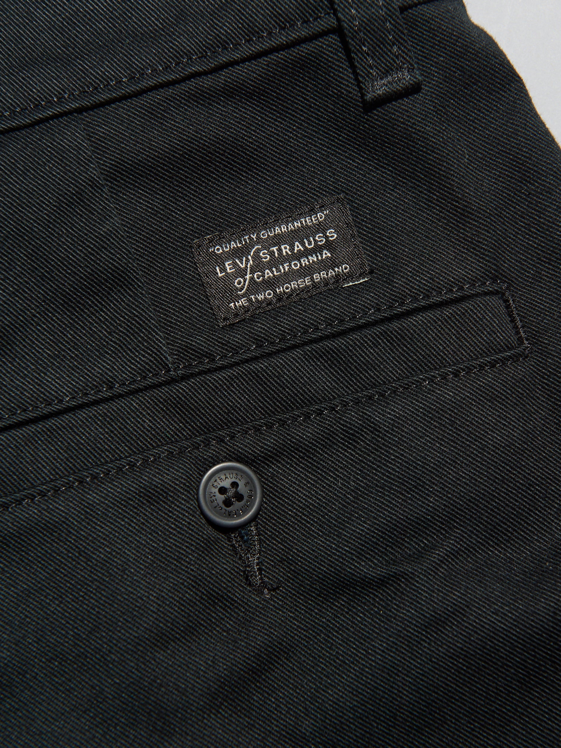 リーバイス®のWORKWEAR ルーズ プリーツ ワークチノのタグ